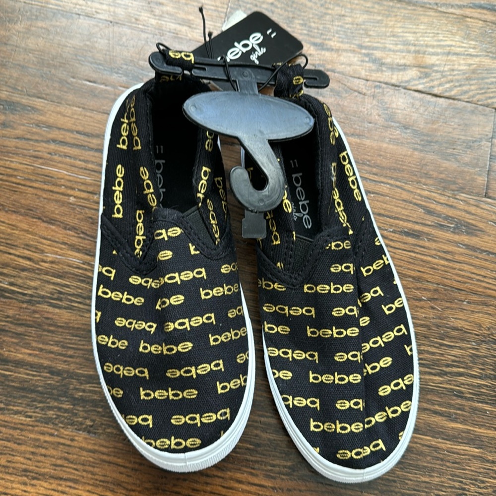 Bebe Girls Black and Gold slip on sneakers size 11 BNWT